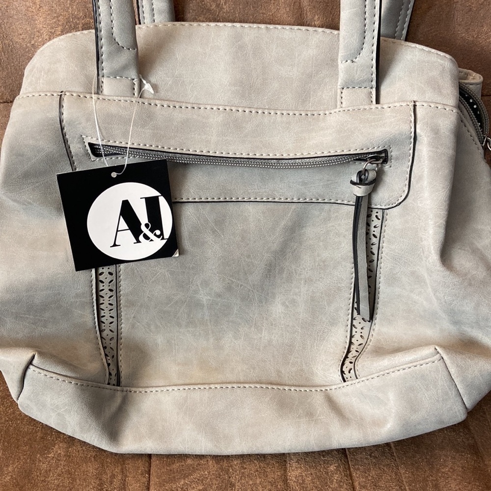 A&i Gray Vinyl Leather purse with multiple pockets. Polka dot lined interior. - Picture 2 of 4